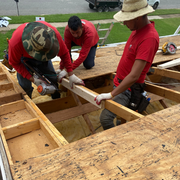 CS1 Construction crew replacing roof decking on a residential home in Maryland.
