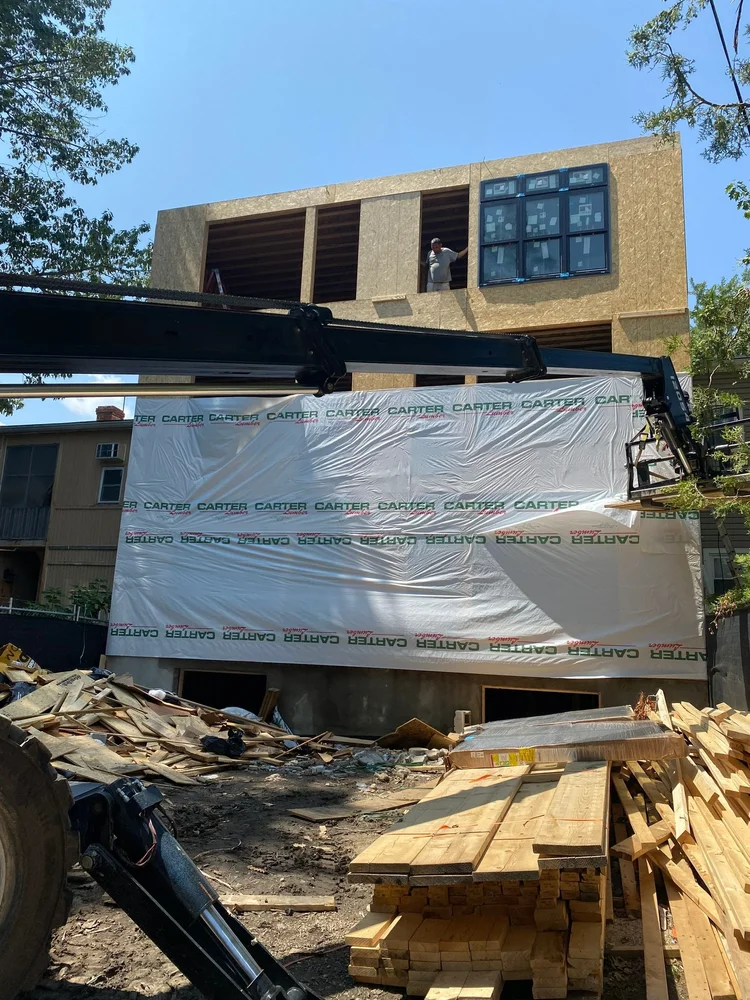 Exterior envelope work underway on a Washington, DC multifamily building by CS1 Construction.