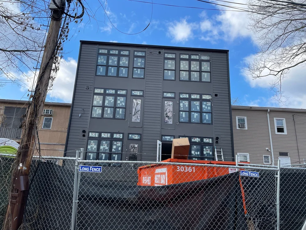 New window installation on a multi-unit Washington, DC renovation by CS1 Construction.