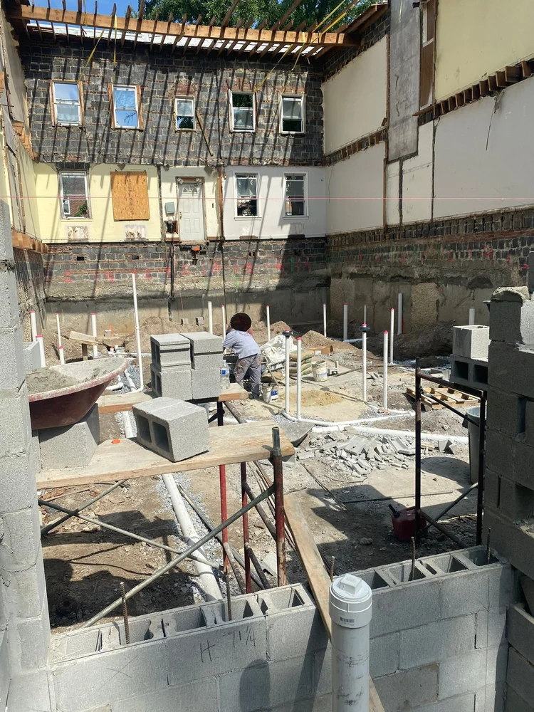 Multifamily facade rebuild in progress on a Washington, DC project by CS1 Construction.