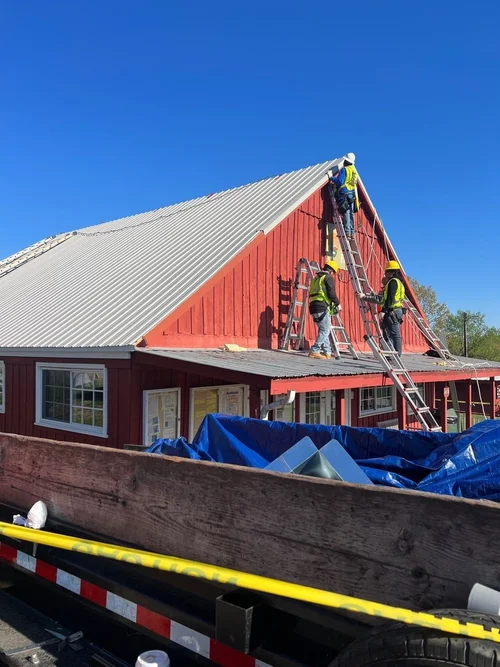 Exterior view of the restored Oxon Hill Farms visitor center in Oxon Hill, MD by CS1 Construction.