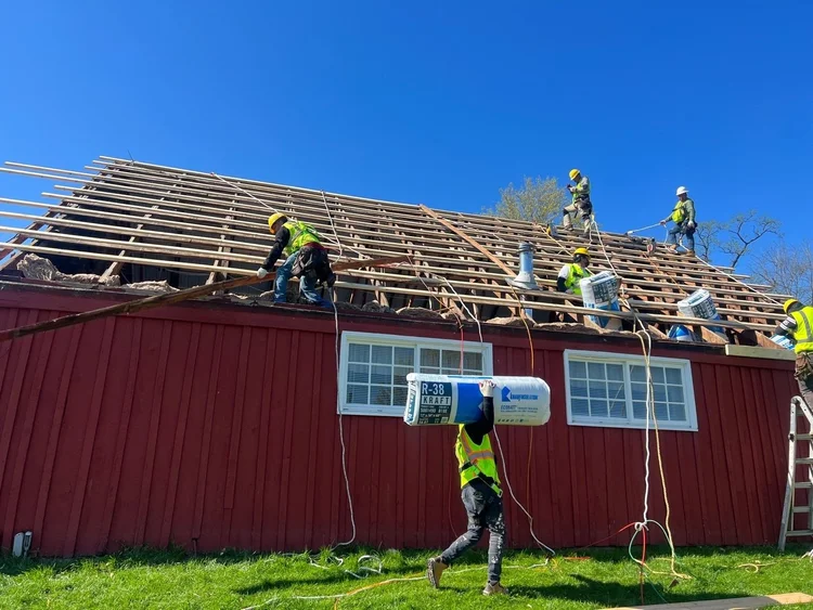 Completed roofing and grounds work at the Oxon Hill Farms visitor center by CS1 Construction.