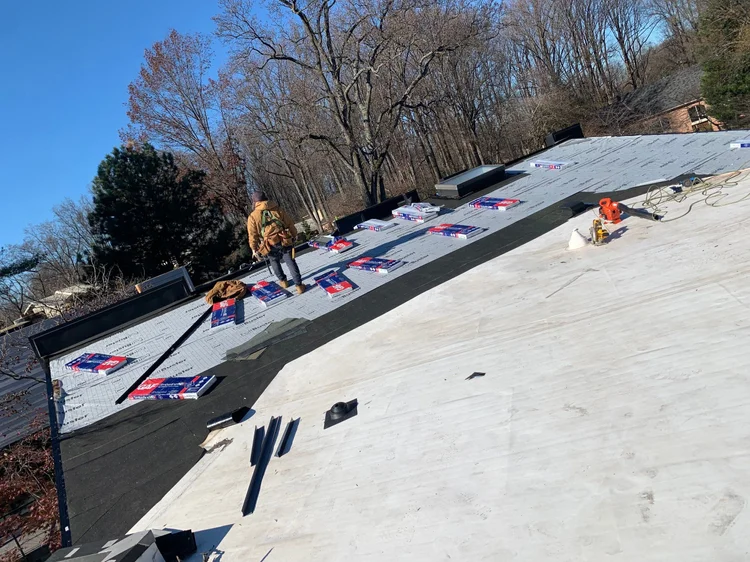 Roofing and siding upgrade on a single-family home by CS1 Construction.